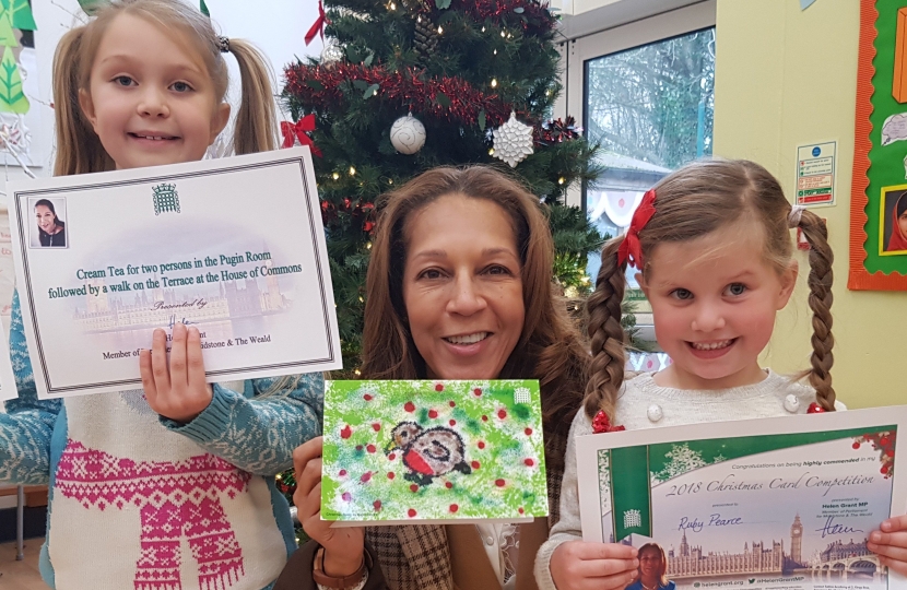 Left to Right: Overall winner Daisy Davies (7), Helen Grant MP, and highly commended entrant Ruby Pearce aged 4, both of Sissinghurst C of E Primary.