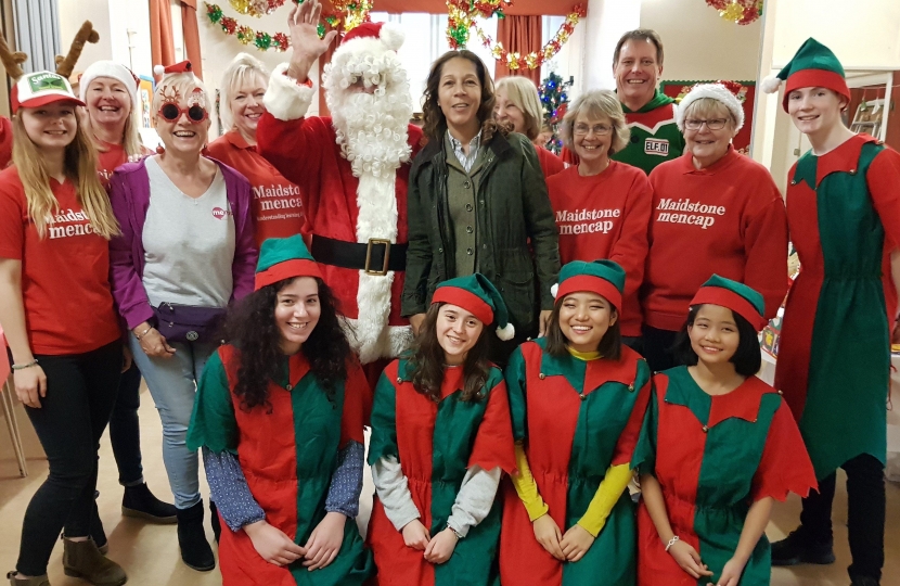 Helen Grant MP with the Maidstone MENCAP Christmas Bazaar team.