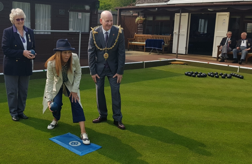 Helen Grant MP bowls the first wood of the season