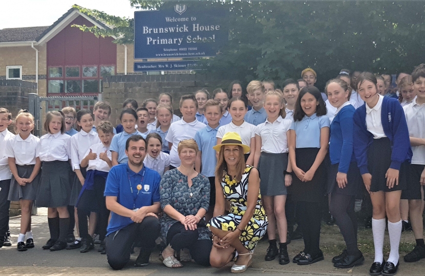Helen with year 6 staff and students at Brunswick House Primary
